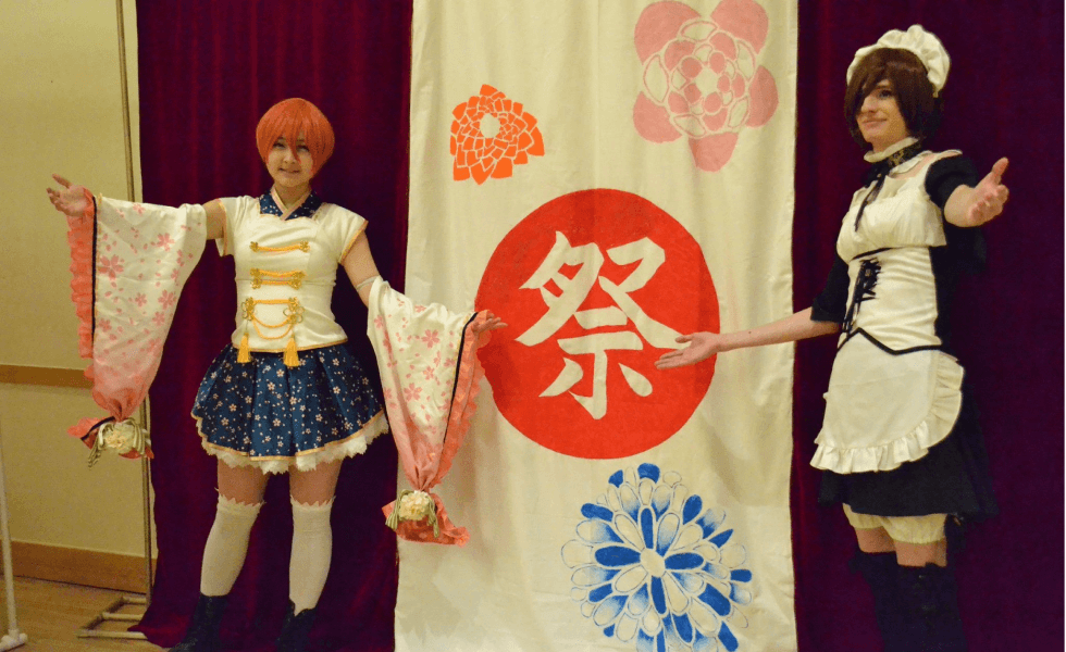 Two people in cosplay posing